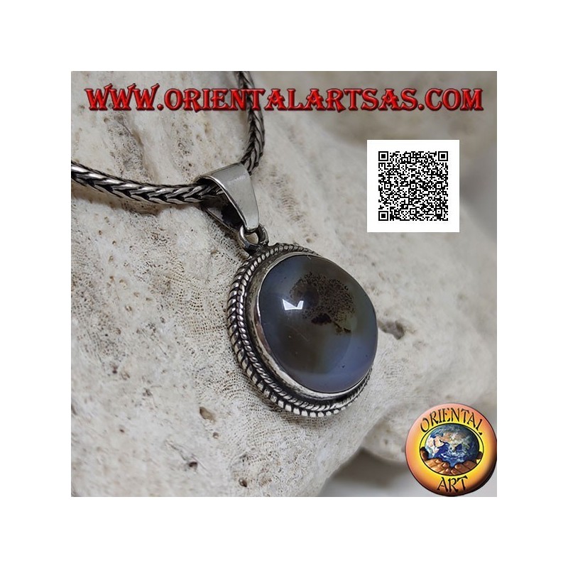 Silver pendant with cabochon oval tourmalinated quartz surrounded by weaving