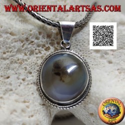 Silver pendant with cabochon oval tourmalinated quartz surrounded by weaving