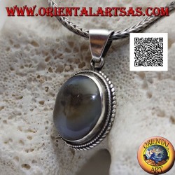 Silver pendant with cabochon oval tourmalinated quartz surrounded by weaving