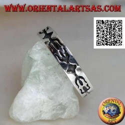 Bague en argent incrustée d'un trident opposé