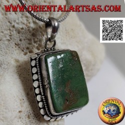 Silver pendant with large rectangular Tibetan antique turquoise surrounded by studs