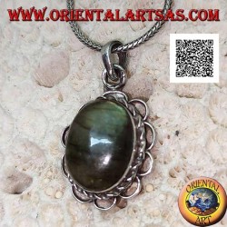 Silver pendant with large oval cabochon labradorite surrounded by cord and semicircles