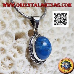 Silver pendant with oval cabochon turquoise surrounded by a double two-dimensional weave