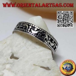 Silver ring with moons and stars on a hollowed background