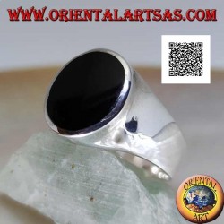 Silver ring with oval onyx flush with slightly raised edge on smooth frame