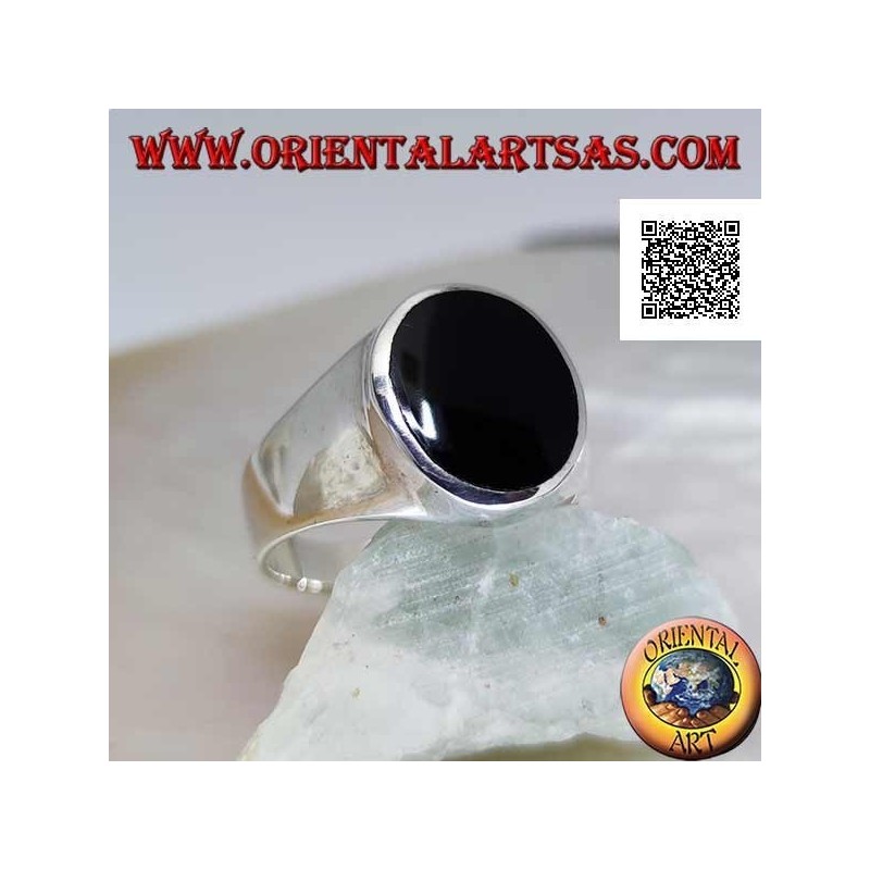 Silver ring with oval onyx flush with slightly raised edge on smooth frame