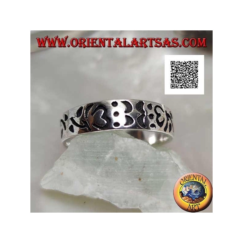 Silver ring with Om (Tibetan mantra) and engraved floral decorations