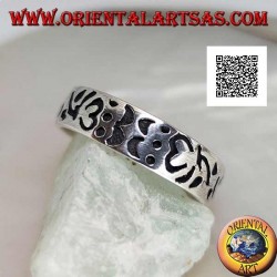 Silver ring with Om (Tibetan mantra) and engraved floral decorations