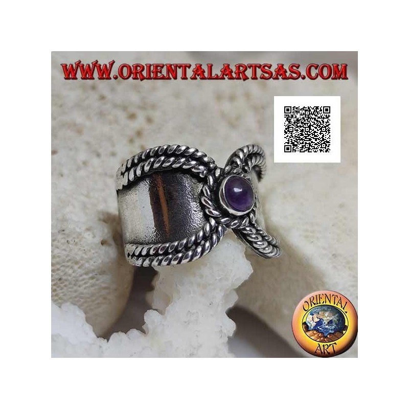 Wide band ring in silver with interweaving on the sides and round amethyst to close