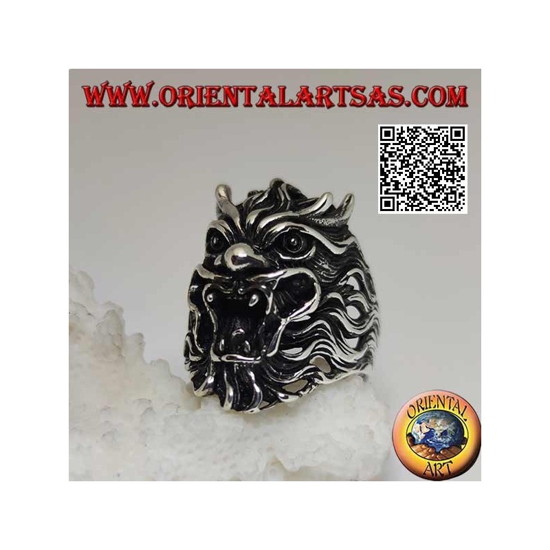 Silver ring in the shape of the face of an evil demon