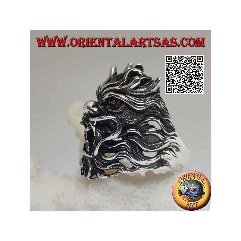 Silver ring in the shape of the face of an evil demon