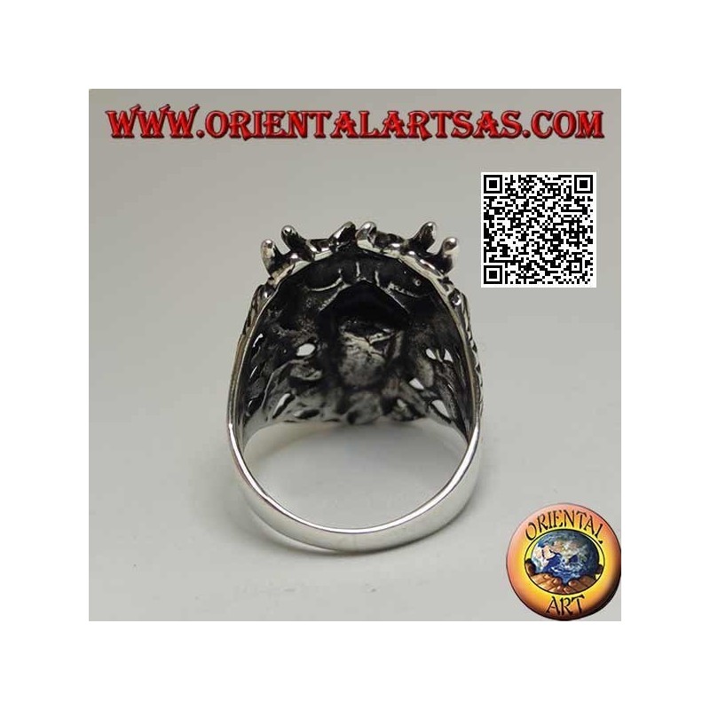 Silver ring in the shape of the face of an evil demon