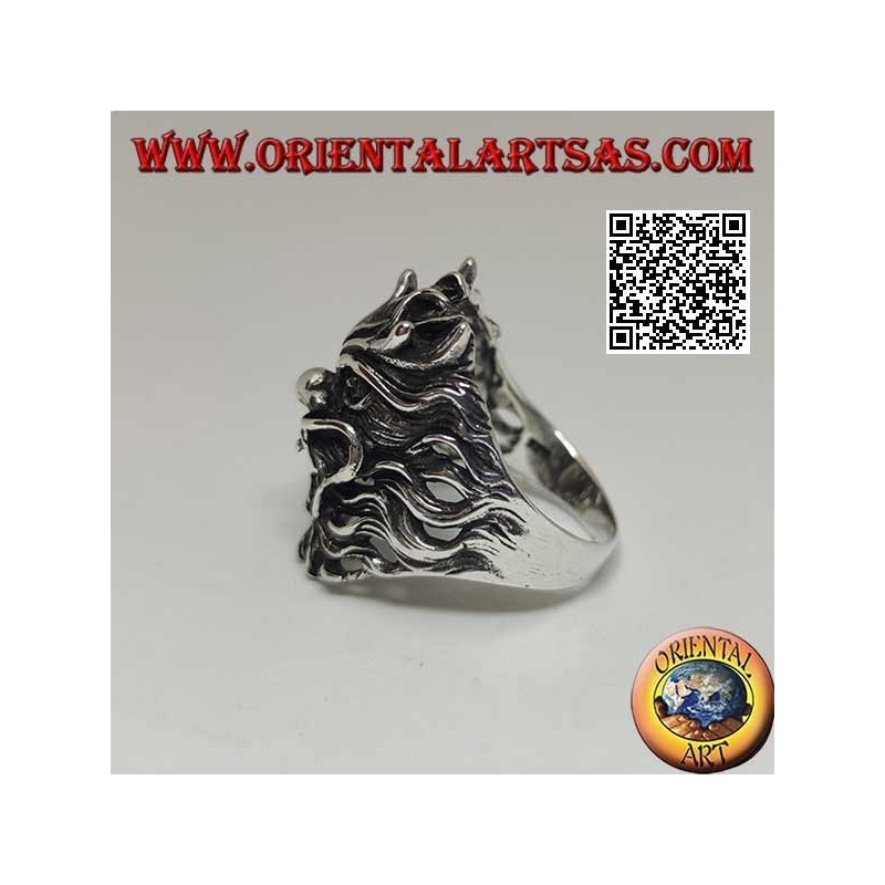 Silver ring in the shape of the face of an evil demon