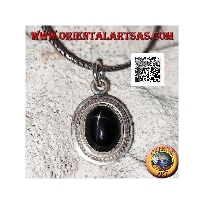 Silver pendant with black star (Diopside) oval cabochon surrounded by weaving