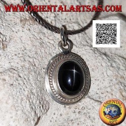 Silver pendant with black star (Diopside) oval cabochon surrounded by weaving