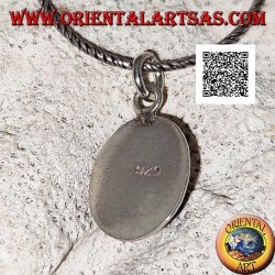 Silver pendant with black star (Diopside) oval cabochon surrounded by weaving