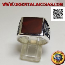Silver ring with square carnelian and profile dragon in bas-relief on the sides