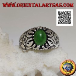 Silver ring with cabochon oval green agate set with claws and embossed floral decorations on the sides