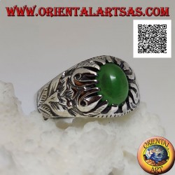 Silver ring with cabochon oval green agate set with claws and embossed floral decorations on the sides