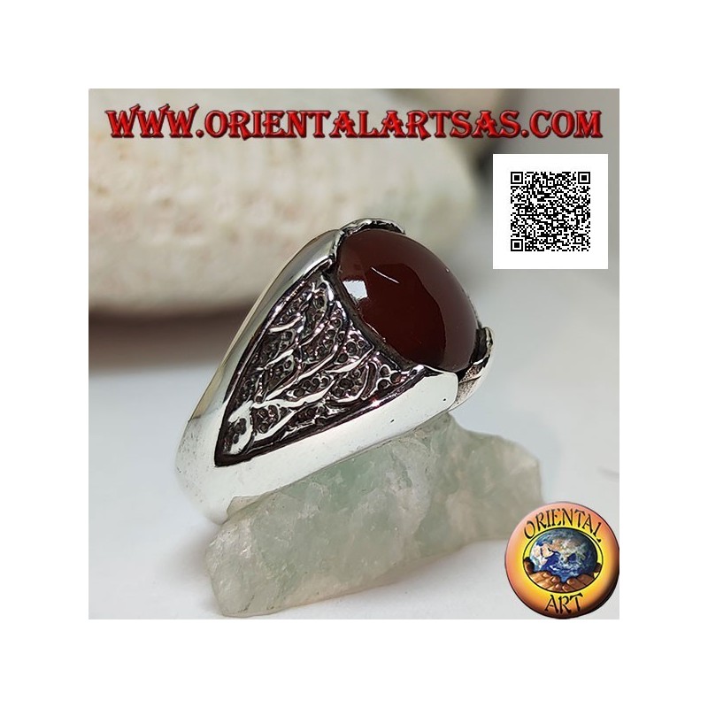 Silver ring with round carnelian and motif in the triangle in bas-relief on the sides