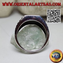 Silver ring with square onyx and clock link on the sides