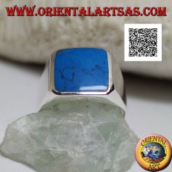 Silver ring with beveled rectangular turquoise set flush with the edge on a smooth frame