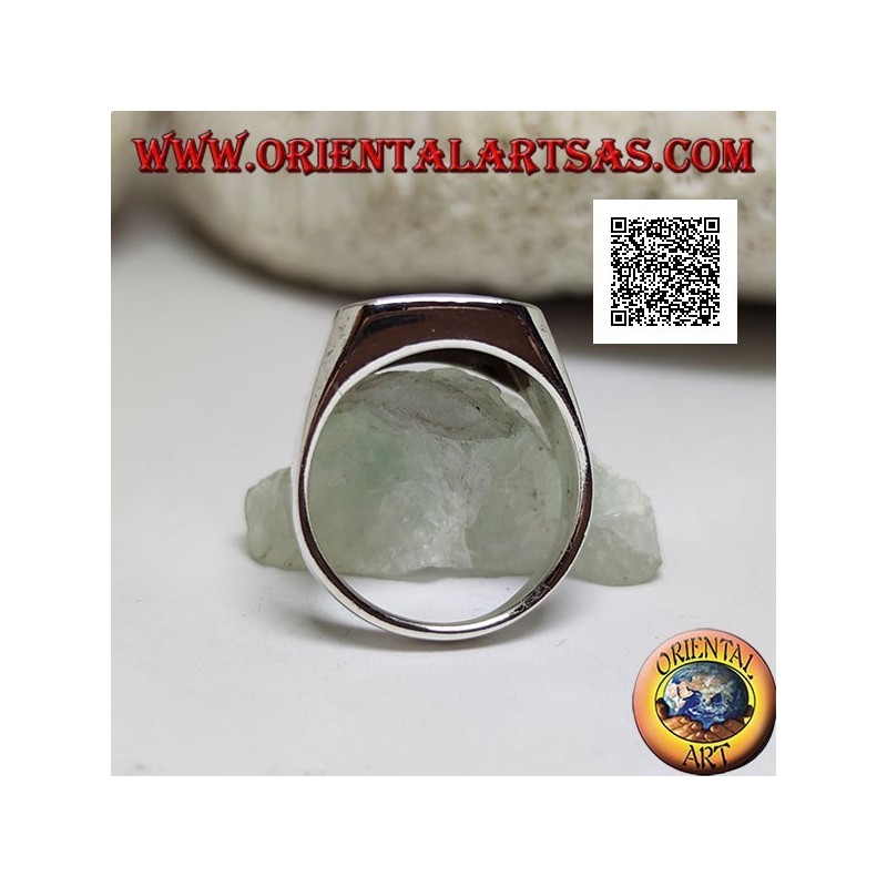Anello in argento con turchese rettangolare smussato incastonato a filo bordo su montatura liscia