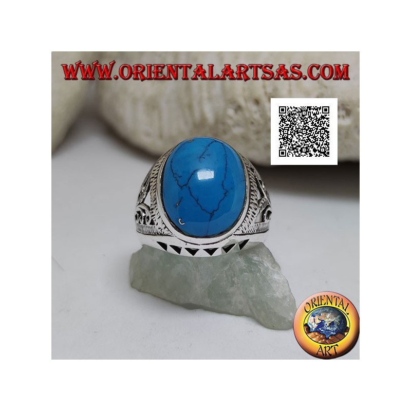 Anello in argento con turchese ovale cabochon e decorazione floreale e a triangolini sui lati