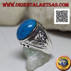 Bague en argent avec cabochon ovale turquoise et décor floral et triangulaire sur les côtés