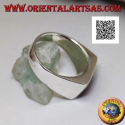 Silver ring with horizontal rectangular carnelian flush with the edge on a smooth setting