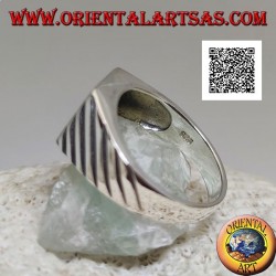 Silver ring with rectangular onyx with onyx flush with the edge and oblique lines engraved on the sides