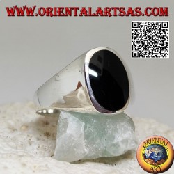 Silver ring with flat oval onyx flush with the edge