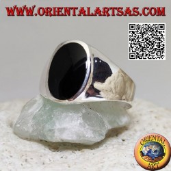 Silver ring with flat oval onyx flush with the edge