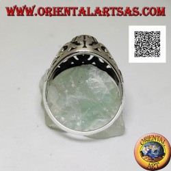 Silver ring with faceted oval onyx and openwork floral decoration on the sides