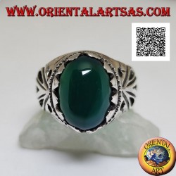 Silver ring with cabochon oval green agate set with openwork decoration on the sides