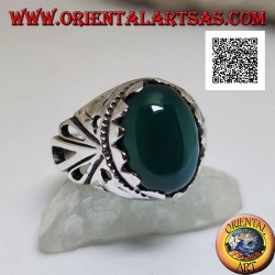 Silver ring with cabochon oval green agate set with openwork decoration on the sides