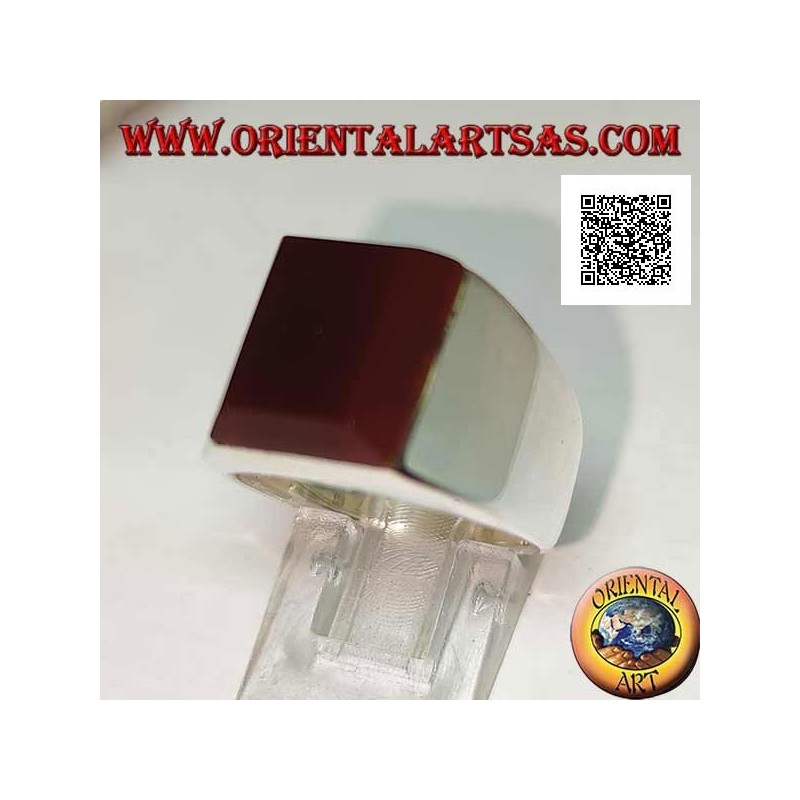 Silver ring with rectangular carnelian superimposed on a smooth setting