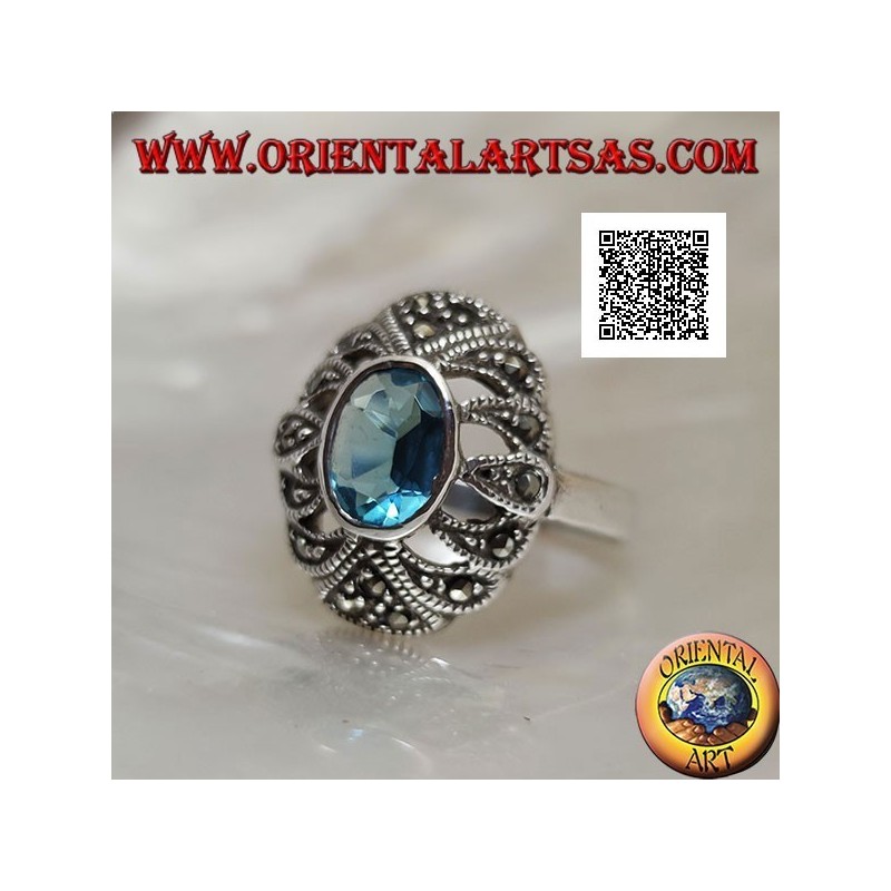 Silberring mit ovalem Blautopas auf einem konvexen perforierten Oval mit Markasit besetzt