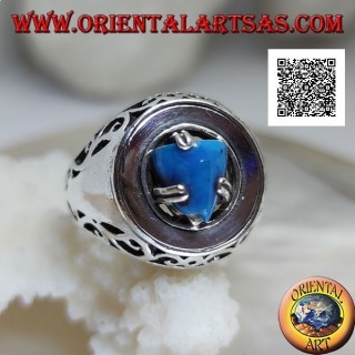 Silver ring with turquoise pyramid set on a smooth disc with floral openwork on the sides
