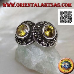 Silver ring with two round yellow topazes in two circles studded with marcasite intersecting each other