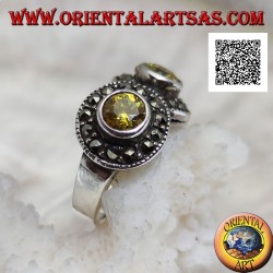 Silver ring with two round yellow topazes in two circles studded with marcasite intersecting each other