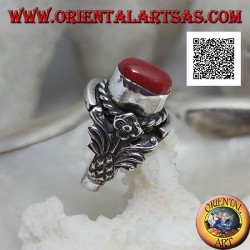Silver ring with oval Tibetan antique coral with interweaving and integral flower on the sides