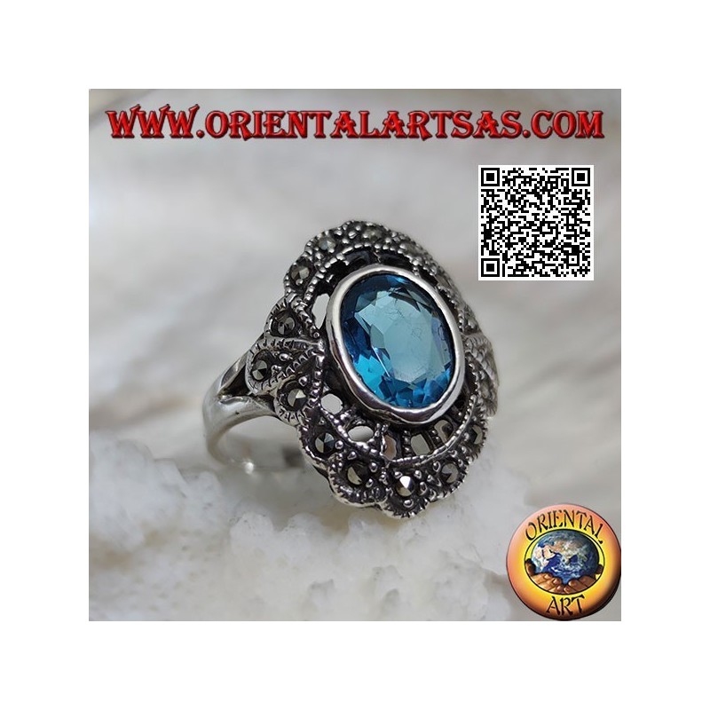 Silberner Wolkenring mit ovalem Blautopas und Markasit