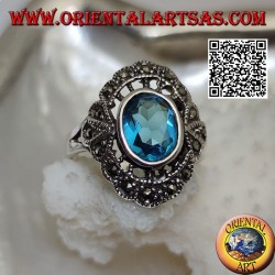 Silberner Wolkenring mit ovalem Blautopas und Markasit