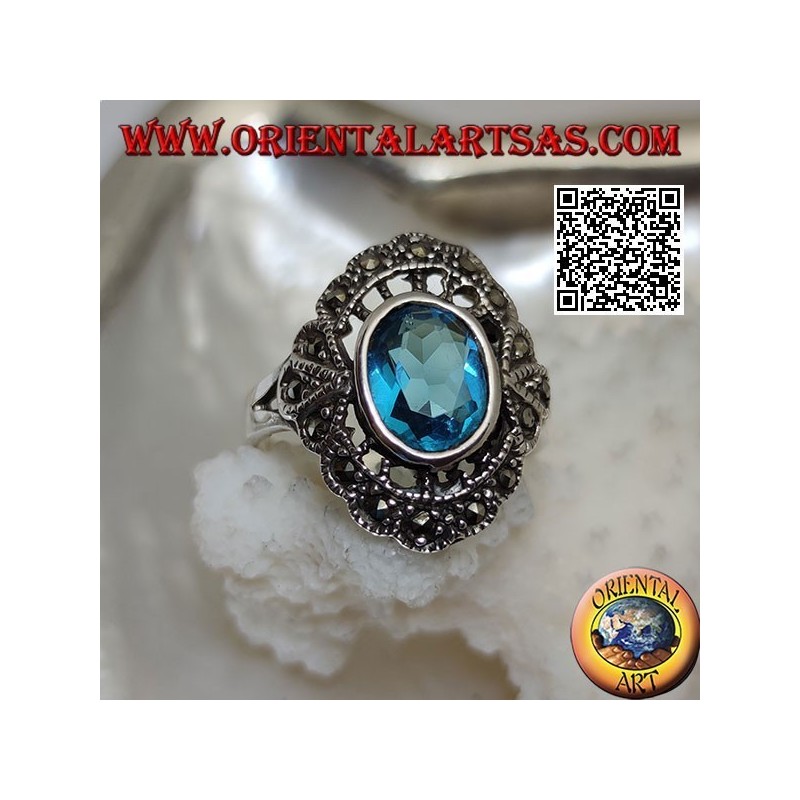 Anillo nube de plata con topacio azul ovalado y marcasita