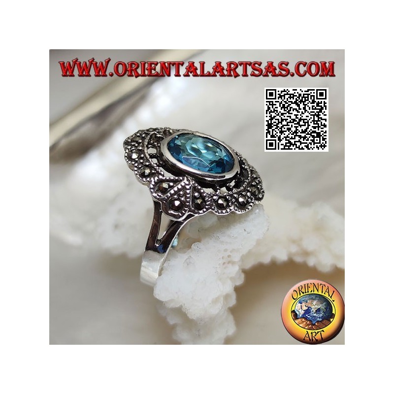 Silver cloud ring with oval blue topaz and marcasite