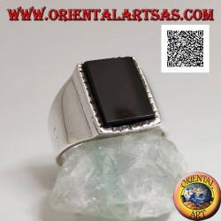 Silver ring with raised rectangular onyx with slightly striped edge on a smooth frame