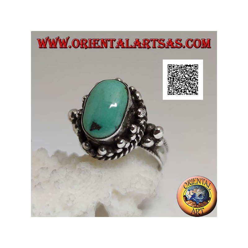 Silver ring with antique oval Tibetan turquoise surrounded by trio of balls and intertwining (16)
