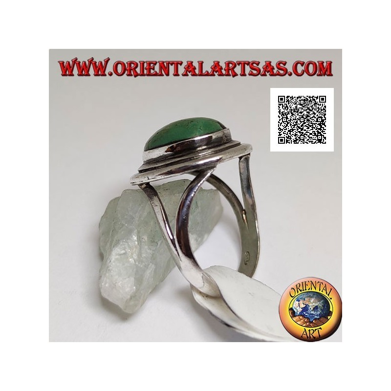 Silver ring with antique oval Tibetan turquoise with double smooth edge laterally hooked to two