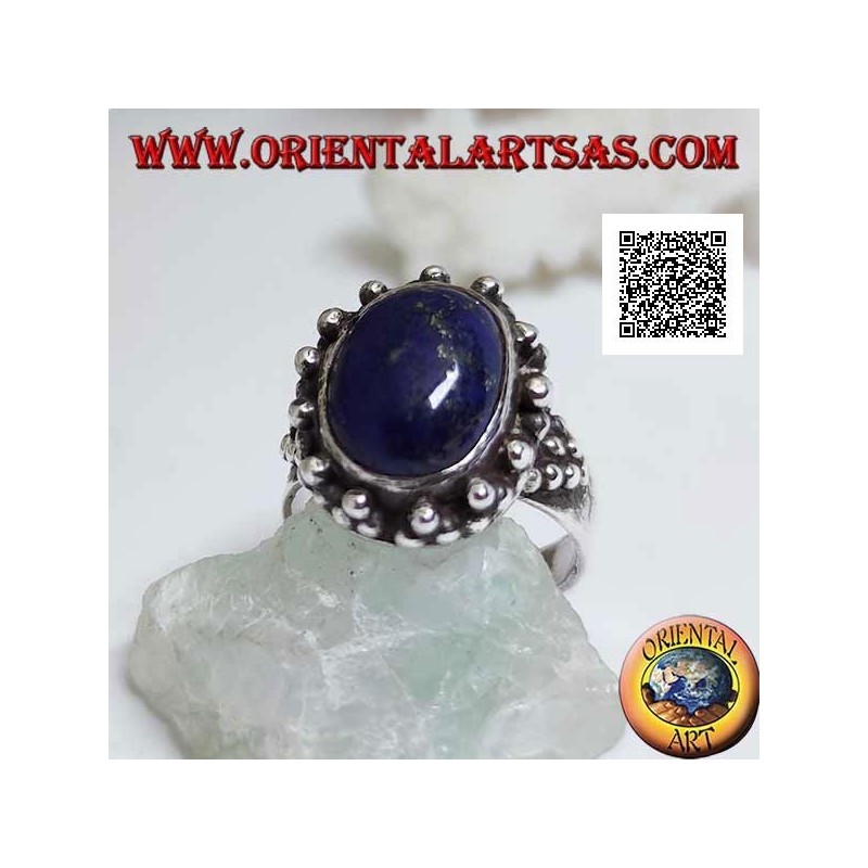 Silver ring with oval lapis lazuli with triangular decoration of balls around and on the sides